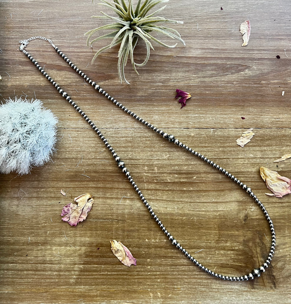 28 inch Graduated Sterling Silver Pearl Necklace